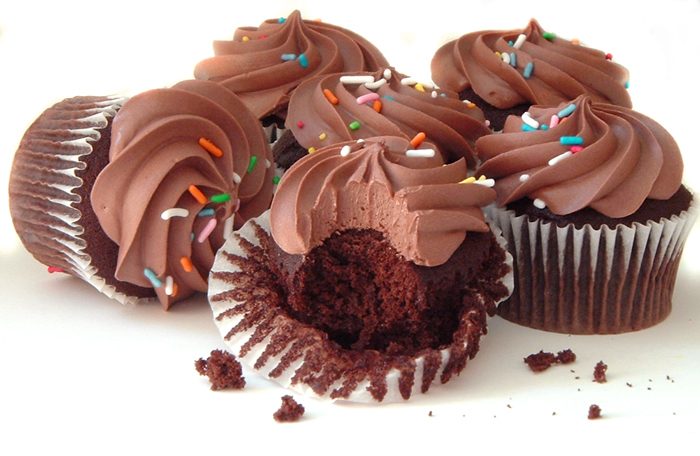Fresh chocolate cupcakes with sprinkles